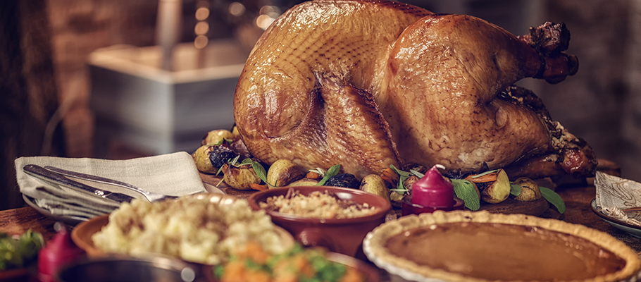 Thanksgiving turkey and sides on a table