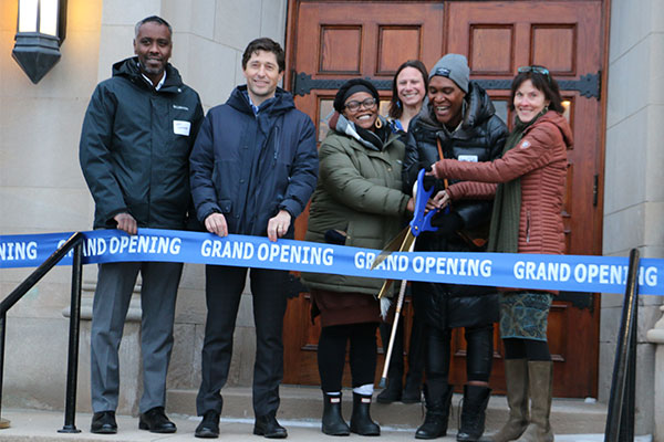 angela conley cutting grand opening tape