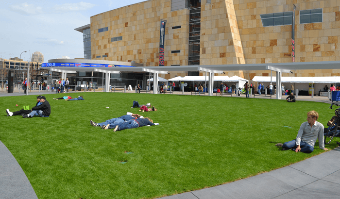 A photo of people enjoying the large outdoor green space.