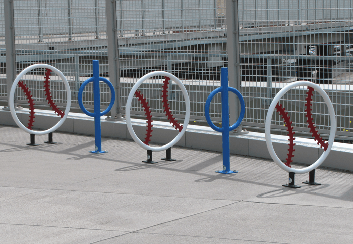 A photo of the creative racks for riders to lock their bikes onto.